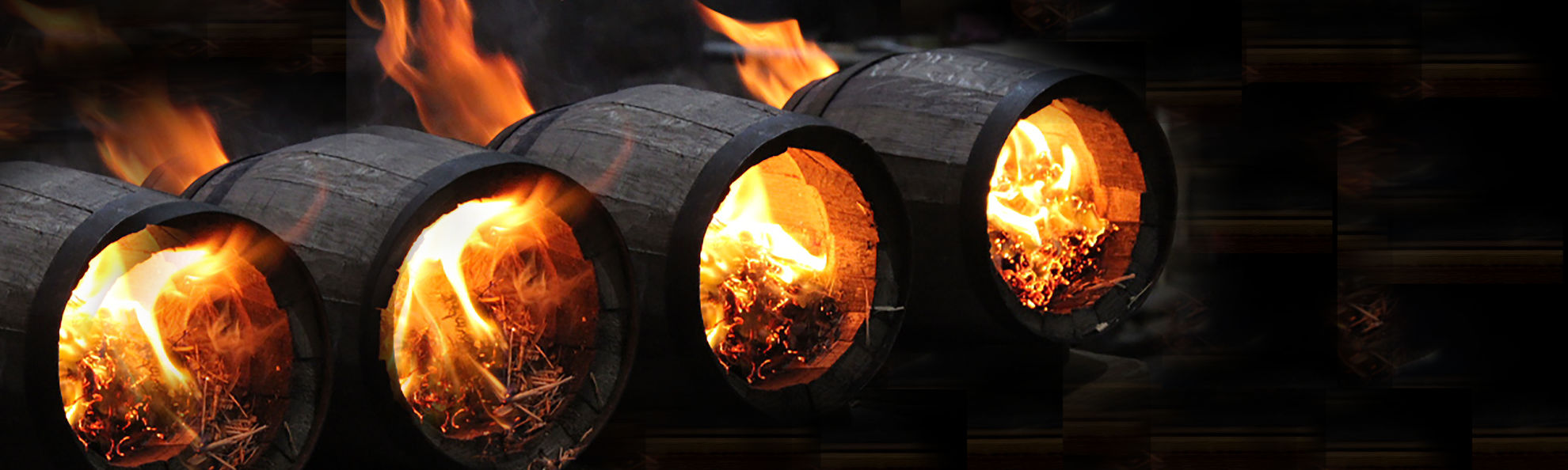 oak barrels being charred